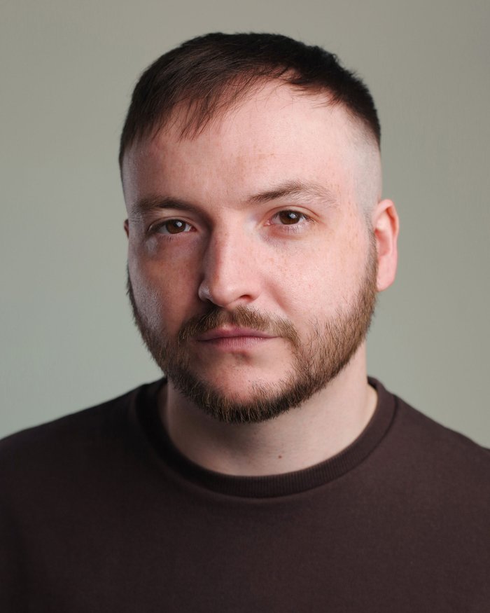 Headshot of Tom Lyons