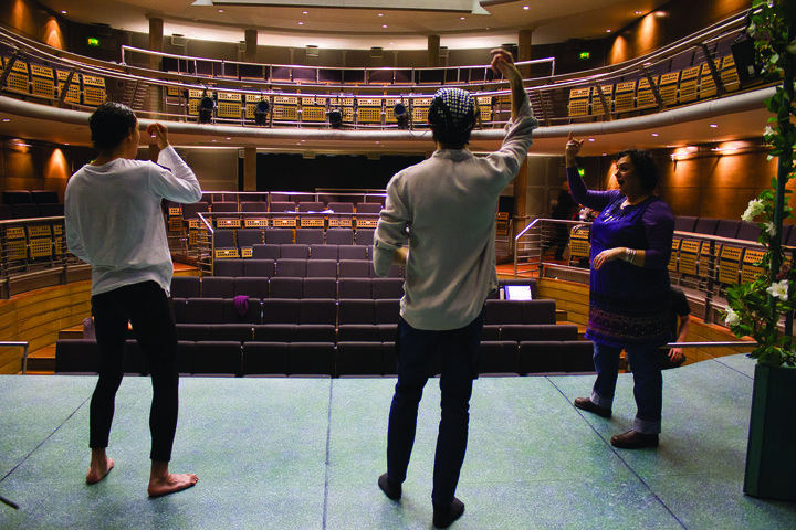 students do vocal warm ups on stage before a performance in the Jerwood Vanbrugh Theatre
